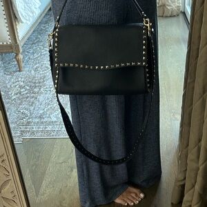 Valentino. Only been worn a handful of times.